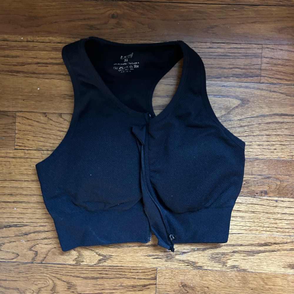 Black and white zip up sports bra
